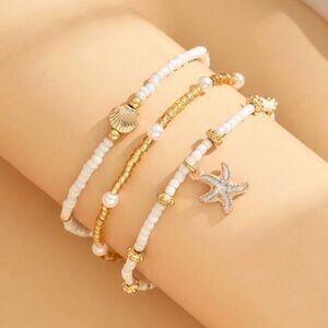 Sea shell beaded stretch gold & cream charm bracelet set of 3